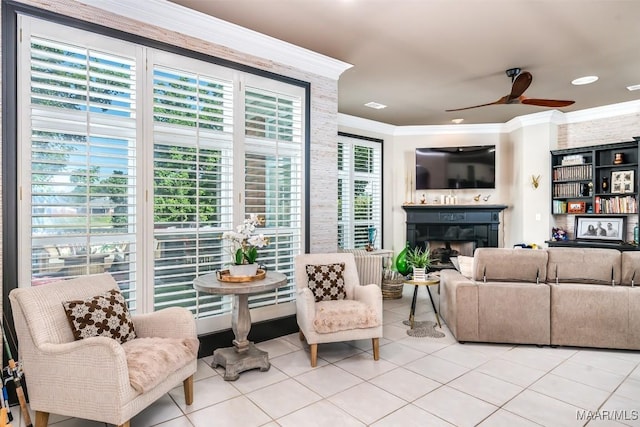 8712 Old Marsh Way, Montgomery, AL 36117 - living room featuring crown molding, ceiling fan, light tile patterned flooring, a fireplace, and recessed lighting