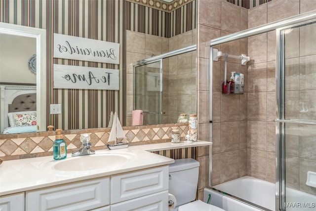 8712 Old Marsh Way, Montgomery, AL 36117 - full bathroom featuring shower / bath combination with glass door, vanity, wallpapered walls, ensuite bathroom, and backsplash