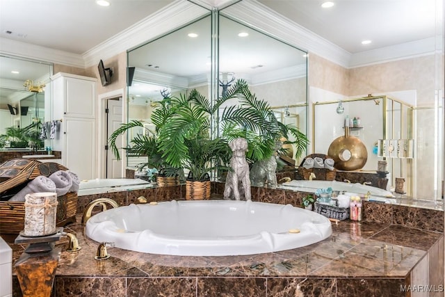 8712 Old Marsh Way, Montgomery, AL 36117 - bathroom with a shower stall, a garden tub, ornamental molding, and recessed lighting