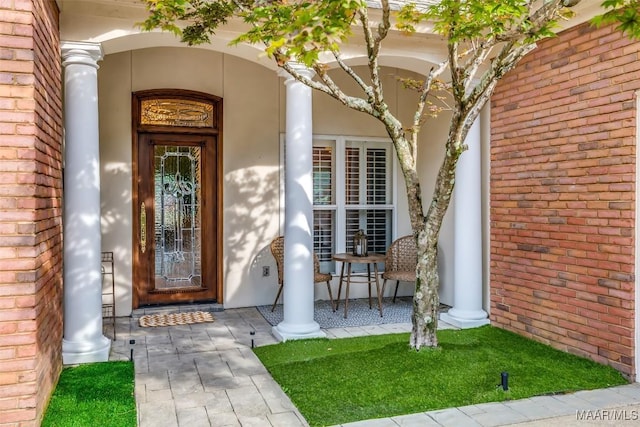 8712 Old Marsh Way, Montgomery, AL 36117 - property entrance featuring a porch and stucco siding
