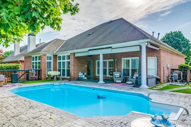 8712 Old Marsh Way, Montgomery, AL 36117 - view of swimming pool with a patio, a gate, and a jacuzzi