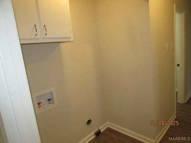 4225 Sunshine Dr, Montgomery, AL 36116 - washroom featuring cabinet space, washer hookup, and dark wood-style floors