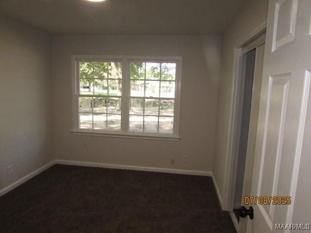 4225 Sunshine Dr, Montgomery, AL 36116 - spare room featuring baseboards and dark carpet