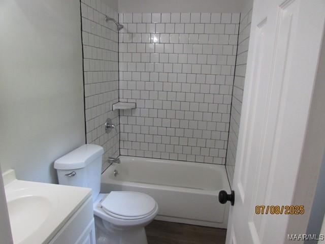 4225 Sunshine Dr, Montgomery, AL 36116 - full bath with vanity, shower / tub combination, and wood finished floors