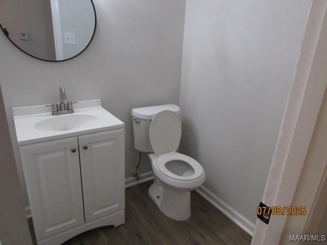 4225 Sunshine Dr, Montgomery, AL 36116 - half bathroom with vanity and wood finished floors