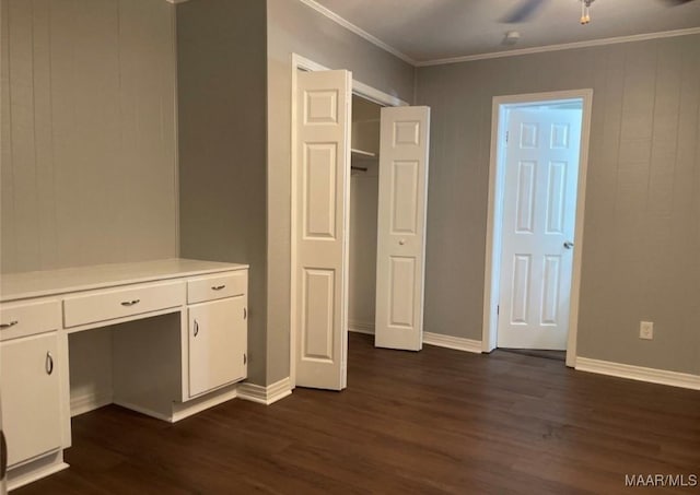 123 Hobbie Dr, Montgomery, AL 36105 - unfurnished bedroom featuring dark wood-type flooring, ornamental molding, and built in study area