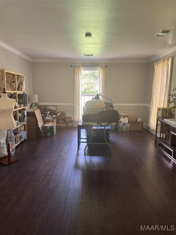3549 Audubon Rd, Montgomery, AL 36111 - recreation room with dark wood finished floors, crown molding, and wainscoting