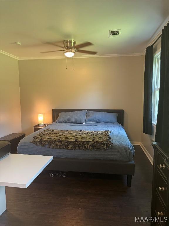 3549 Audubon Rd, Montgomery, AL 36111 - bedroom with crown molding, wood finished floors, and ceiling fan