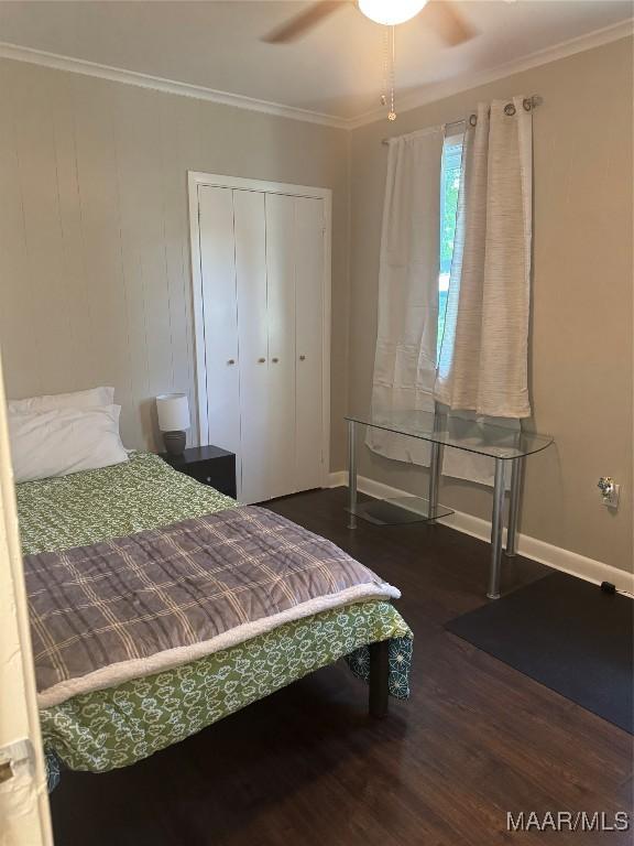 3549 Audubon Rd, Montgomery, AL 36111 - bedroom with wood finished floors, ornamental molding, a closet, and ceiling fan