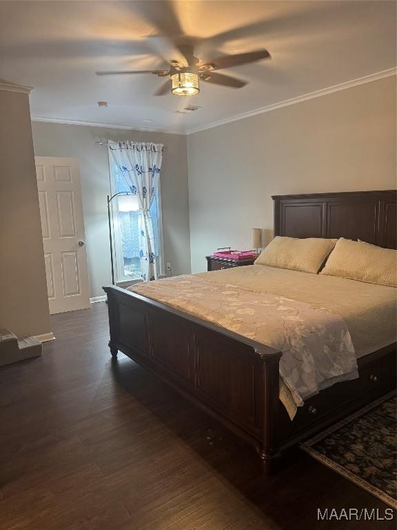 3549 Audubon Rd, Montgomery, AL 36111 - bedroom with dark wood finished floors, ornamental molding, and ceiling fan