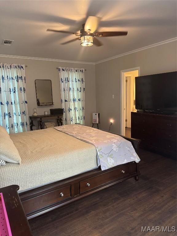 3549 Audubon Rd, Montgomery, AL 36111 - bedroom featuring ornamental molding, wood finished floors, and a ceiling fan