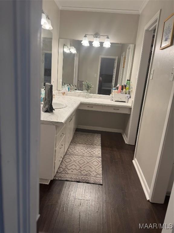 3549 Audubon Rd, Montgomery, AL 36111 - full bath featuring hardwood / wood-style floors, double vanity, and ornamental molding