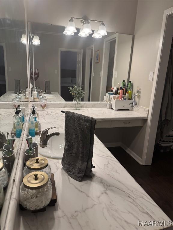 3549 Audubon Rd, Montgomery, AL 36111 - bathroom featuring vanity and a chandelier