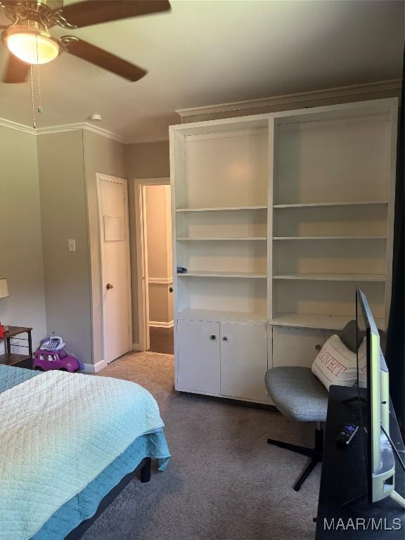 3549 Audubon Rd, Montgomery, AL 36111 - unfurnished bedroom featuring carpet floors, ornamental molding, and ceiling fan