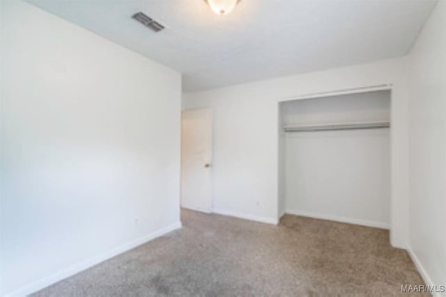 4230 Knollgate Rd, Montgomery, AL 36116 - unfurnished bedroom featuring carpet and a closet