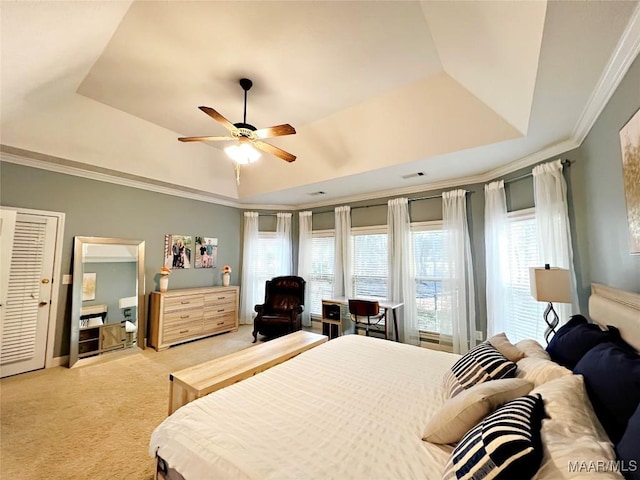 267 River Birch Cir, Wetumpka, AL 36093 - bedroom with a tray ceiling, light carpet, crown molding, and a ceiling fan