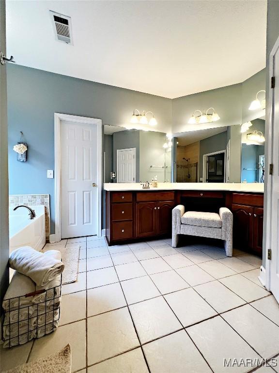 267 River Birch Cir, Wetumpka, AL 36093 - bathroom featuring double vanity, tile patterned flooring, and a bath
