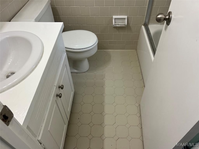 341 Sultan Ct, Montgomery, AL 36117 - full bathroom featuring tile walls and vanity