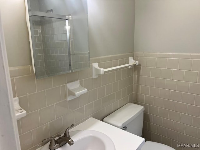 341 Sultan Ct, Montgomery, AL 36117 - bathroom with tile walls, a shower, and vanity