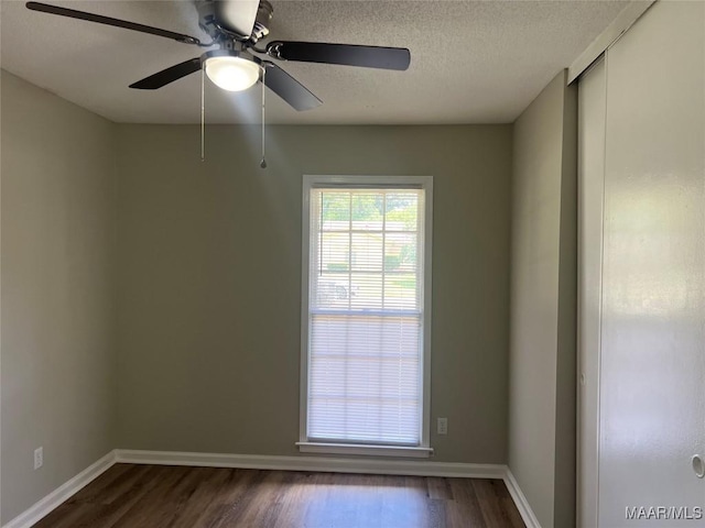 341 Sultan Ct, Montgomery, AL 36117 - unfurnished room featuring dark wood-style floors, a textured ceiling, and ceiling fan