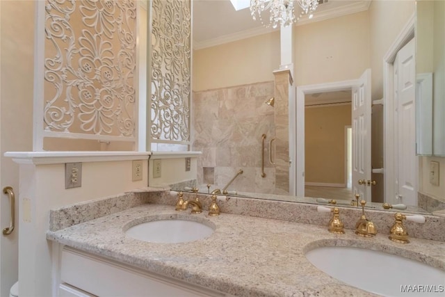 1609 Wentworth Dr, Montgomery, AL 36106 - full bath featuring double vanity, a tile shower, ornamental molding, and a chandelier