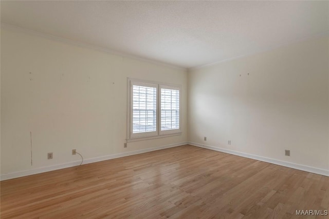 1609 Wentworth Dr, Montgomery, AL 36106 - empty room featuring light wood-style flooring and crown molding