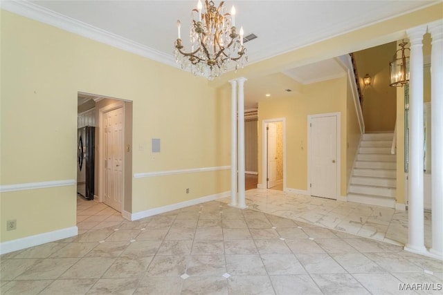 1609 Wentworth Dr, Montgomery, AL 36106 - unfurnished room with ornamental molding, stairs, a chandelier, and decorative columns