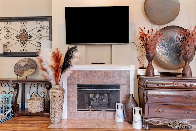 8531 Pipit Ct, Montgomery, AL 36117 - living room featuring a fireplace and wood finished floors