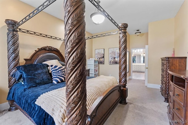 8531 Pipit Ct, Montgomery, AL 36117 - carpeted bedroom with baseboards and ensuite bathroom