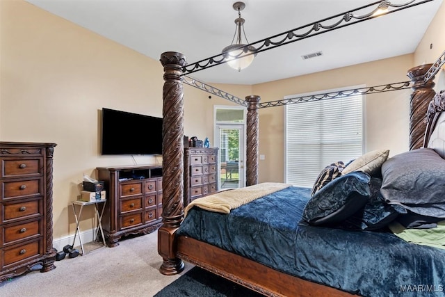 8531 Pipit Ct, Montgomery, AL 36117 - bedroom featuring light colored carpet and access to exterior
