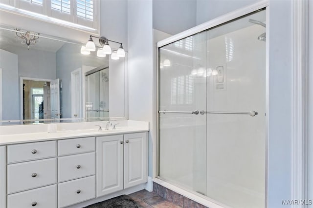 8531 Pipit Ct, Montgomery, AL 36117 - bathroom featuring a stall shower, vanity, and tile patterned floors