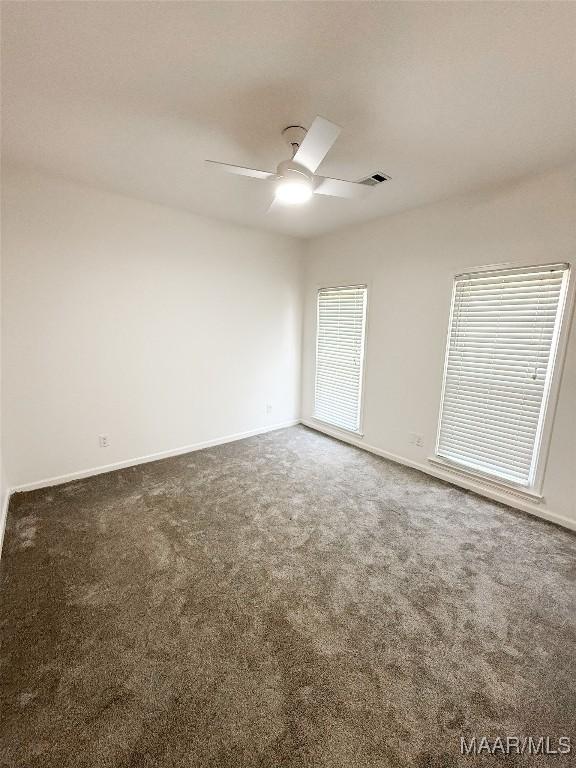 8524 Plantation Ridge Rd, Montgomery, AL 36116 - empty room featuring carpet floors and a ceiling fan