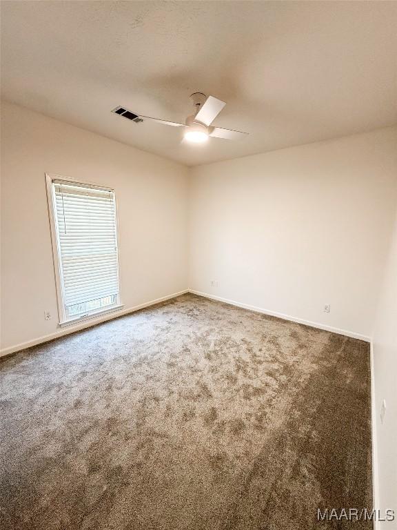 8524 Plantation Ridge Rd, Montgomery, AL 36116 - spare room featuring a ceiling fan and carpet floors