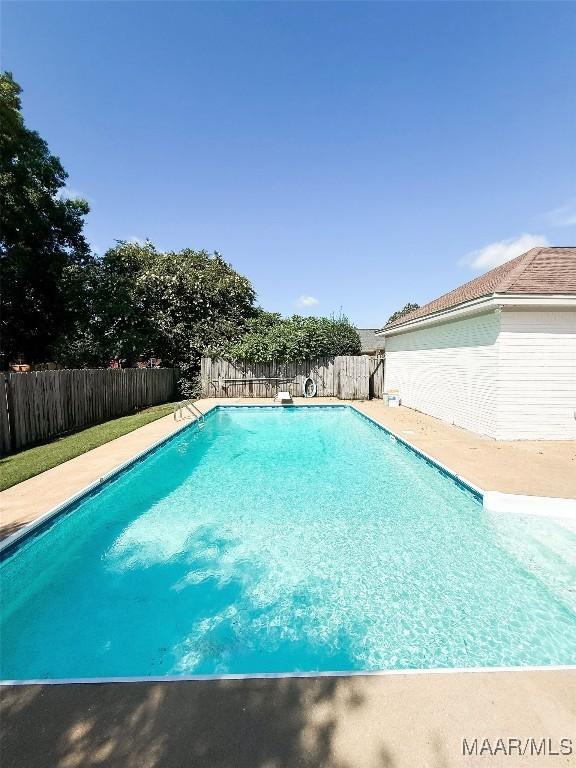 8524 Plantation Ridge Rd, Montgomery, AL 36116 - view of swimming pool with a fenced backyard