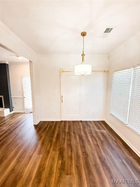 8524 Plantation Ridge Rd, Montgomery, AL 36116 - spare room with dark wood-style flooring and crown molding