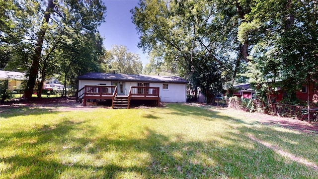 3427 Vance Ln, Montgomery, AL 36109 - rear view of house with a wooden deck