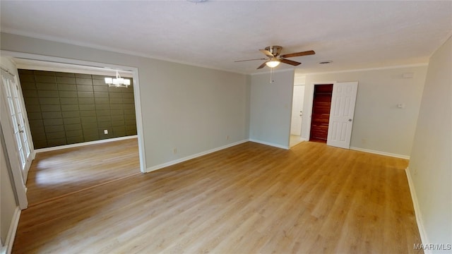 3427 Vance Ln, Montgomery, AL 36109 - empty room with ceiling fan, light wood-style flooring, a chandelier, and crown molding