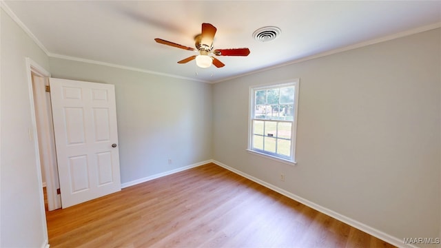 3427 Vance Ln, Montgomery, AL 36109 - spare room with light wood-type flooring, crown molding, and a ceiling fan