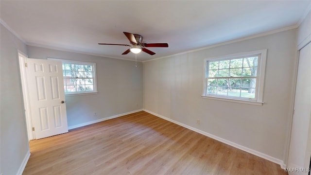3427 Vance Ln, Montgomery, AL 36109 - empty room featuring healthy amount of natural light, light wood-style floors, ornamental molding, and a ceiling fan