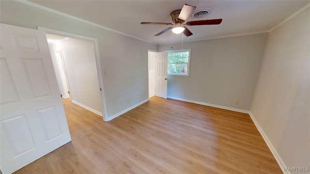 3427 Vance Ln, Montgomery, AL 36109 - unfurnished room with a ceiling fan, light wood-style flooring, and ornamental molding