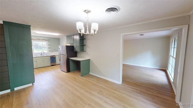 3427 Vance Ln, Montgomery, AL 36109 - kitchen with open shelves, green cabinetry, light countertops, a chandelier, and light wood-style floors