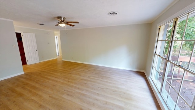 3427 Vance Ln, Montgomery, AL 36109 - empty room featuring ceiling fan, light wood-style flooring, and ornamental molding