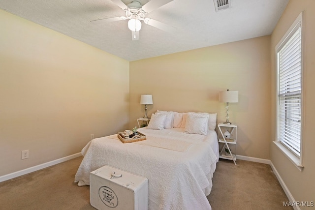 2014 Commodore St, Montgomery, AL 36106 - bedroom featuring carpet floors, multiple windows, and ceiling fan