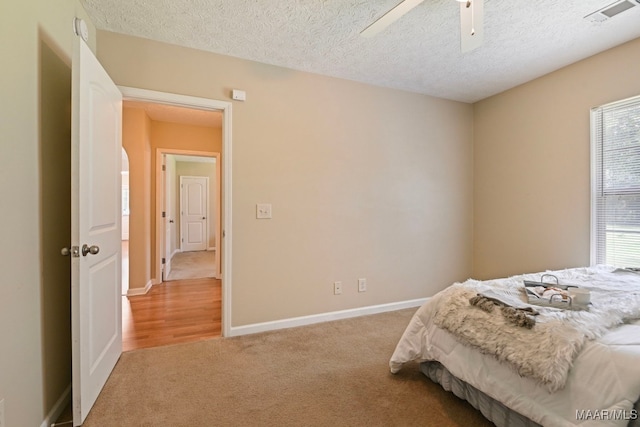 2014 Commodore St, Montgomery, AL 36106 - carpeted bedroom featuring a textured ceiling and ceiling fan