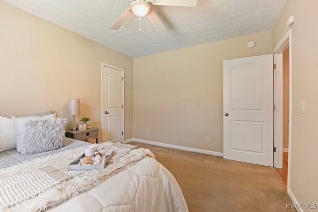 2014 Commodore St, Montgomery, AL 36106 - carpeted bedroom with a textured ceiling and a ceiling fan