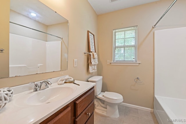 2014 Commodore St, Montgomery, AL 36106 - full bathroom featuring vanity, tile patterned floors, and bathing tub / shower combination