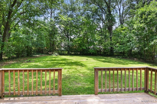 2014 Commodore St, Montgomery, AL 36106 - view of green lawn with a deck