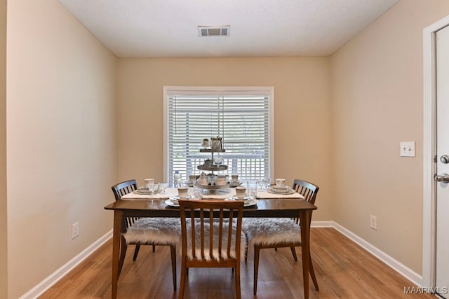 2014 Commodore St, Montgomery, AL 36106 - dining space with wood finished floors and baseboards