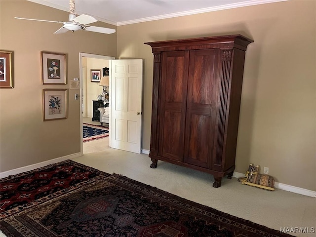 1682 Landline Rd, Selma, AL 36701 - carpeted bedroom featuring ornamental molding and a ceiling fan