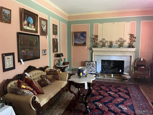 1682 Landline Rd, Selma, AL 36701 - living room featuring crown molding and a premium fireplace